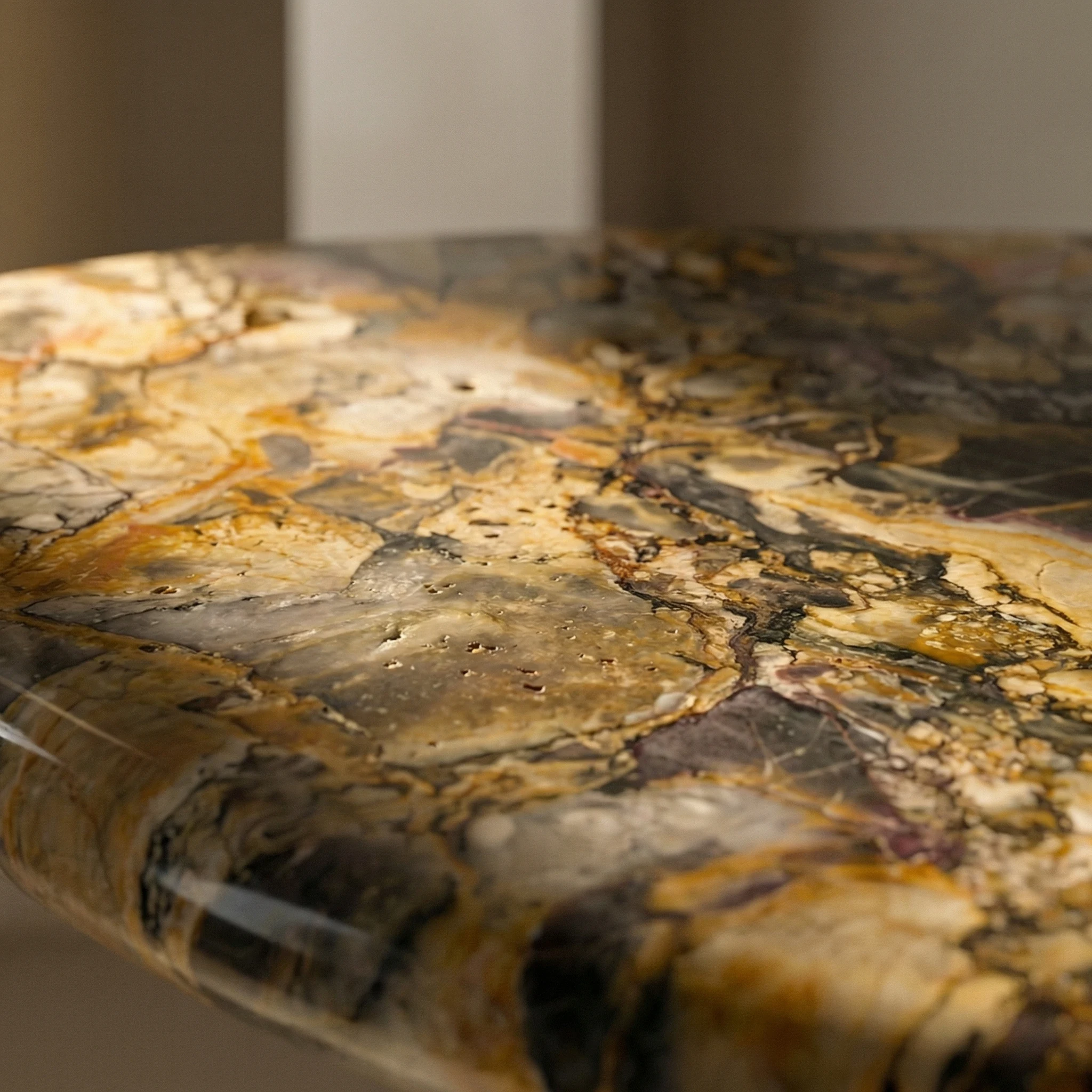 Hand-finished marble surface — light and texture
